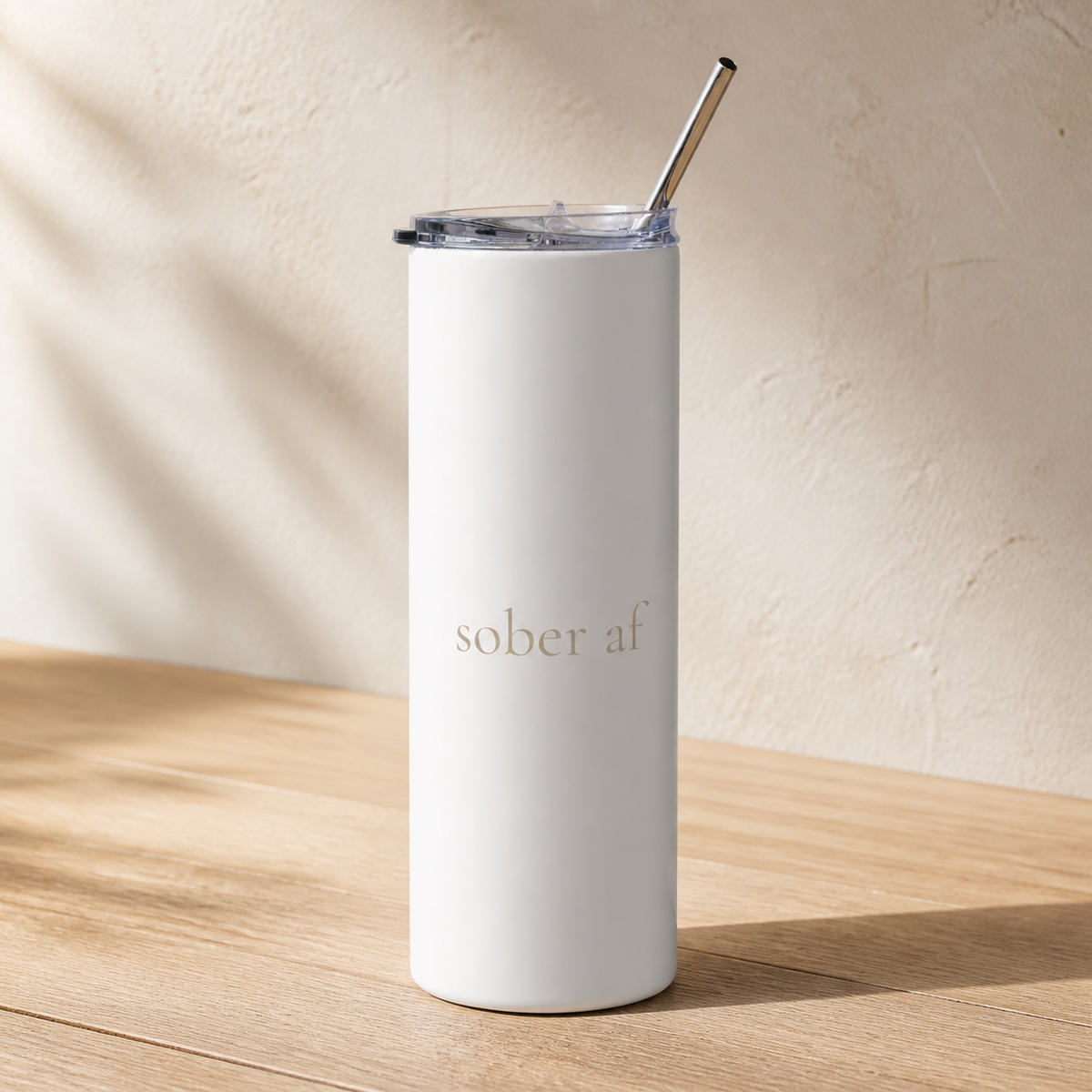 SOBER AF white tumbler on pale oak